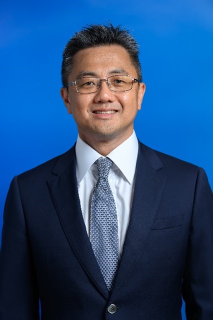 Mr. Pat-Nie Woo